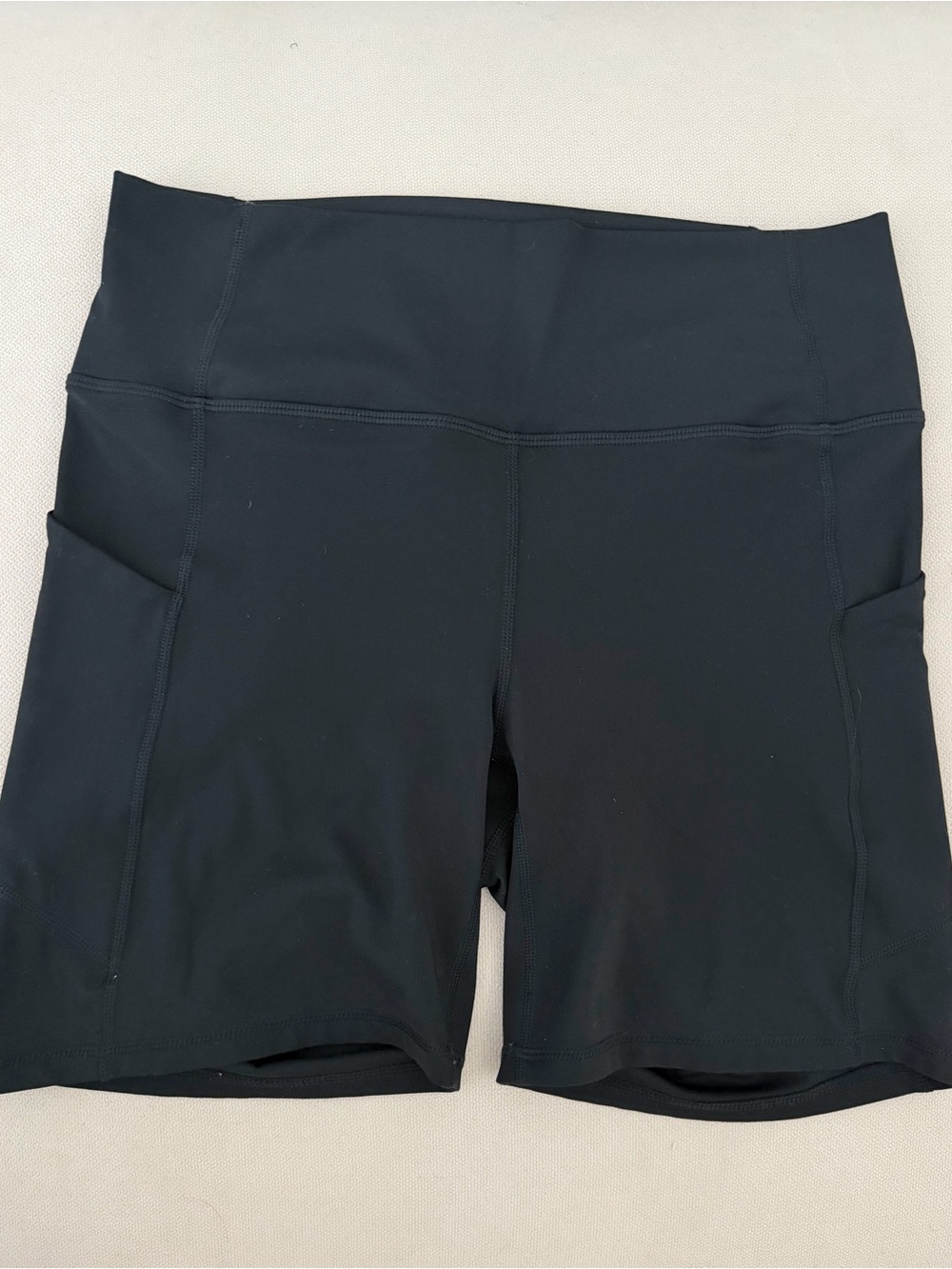 Fabletics PureLux Black High-Rise Bike Shorts with Side Pockets